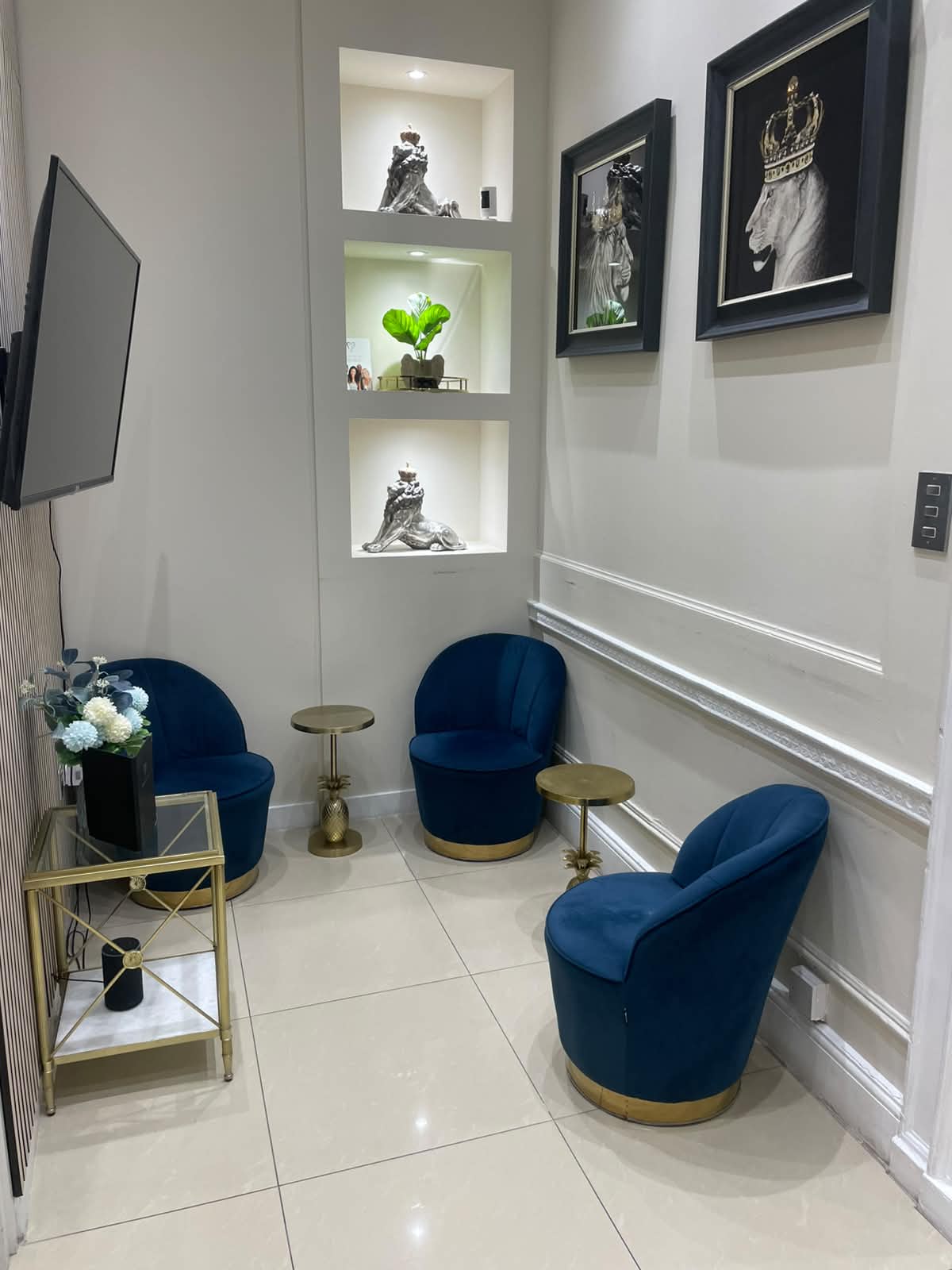 Refined Harley Street waiting area with velvet seating and warm wood detailing