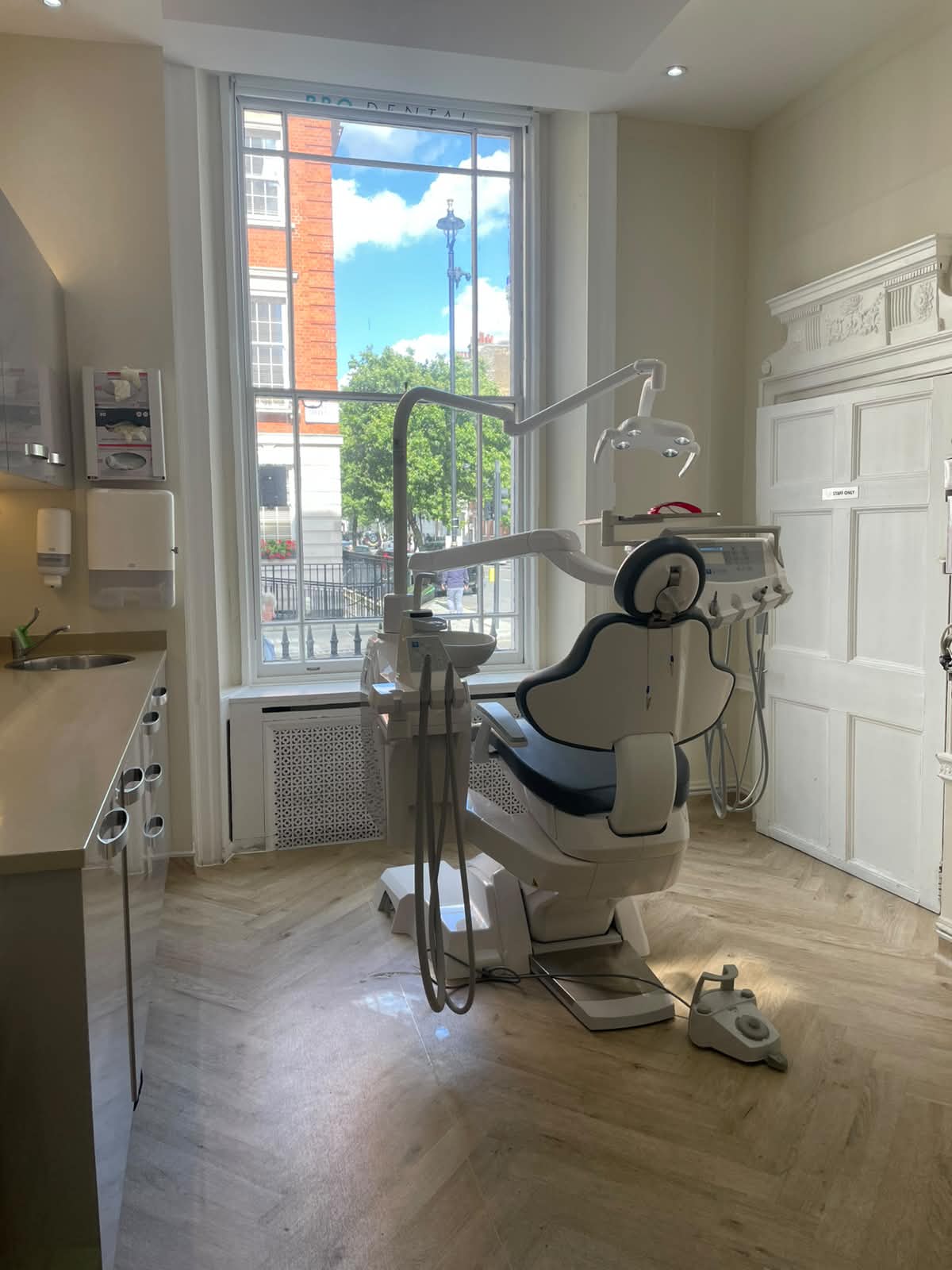Room 1 — treatment room with natural light on Harley Street