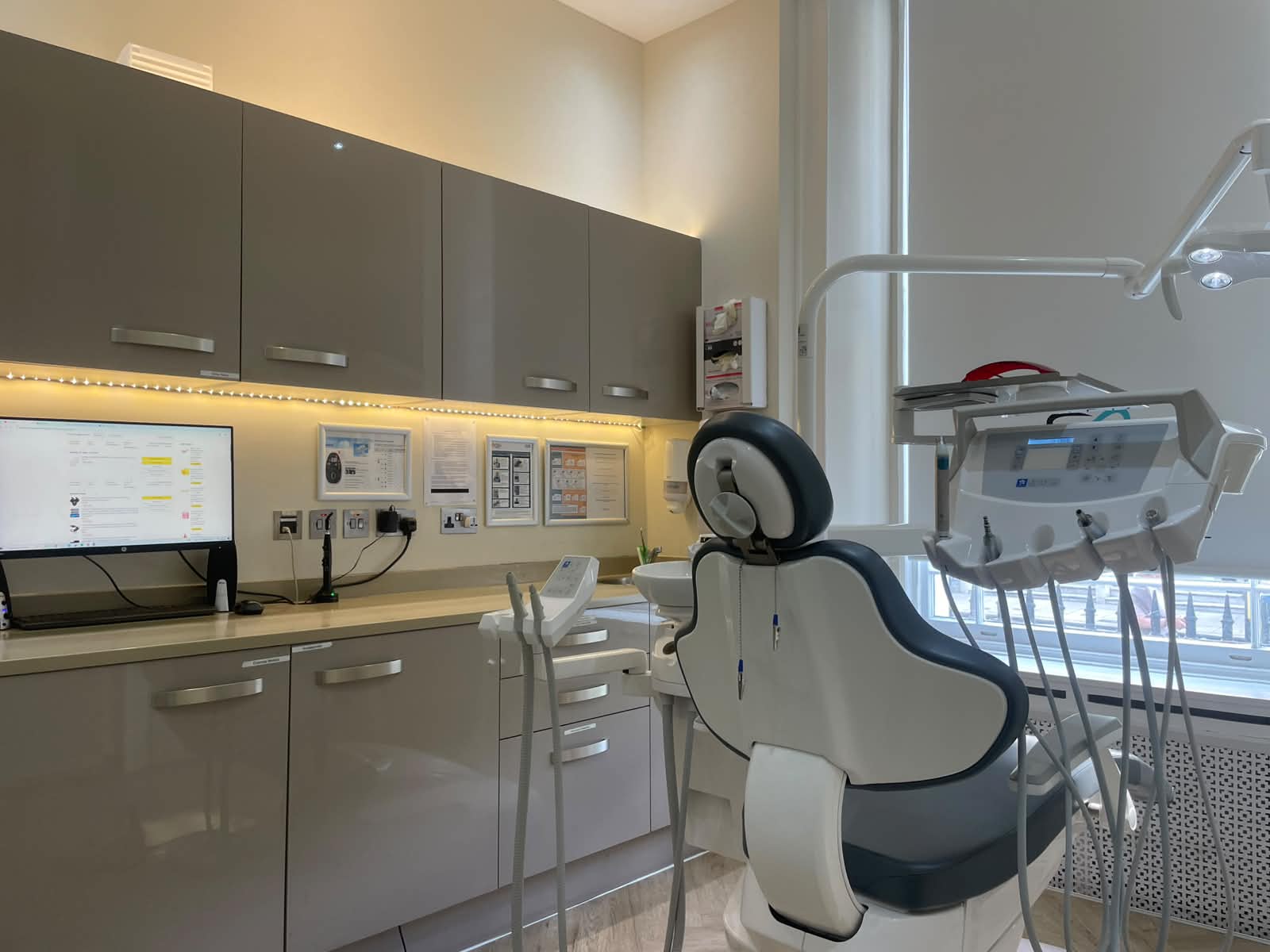 Surgery chair beside a bright sash window